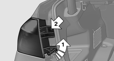 4. Grasp the inner edge of the tail lamp and