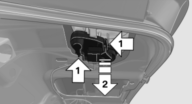 2. Press the defective bulb gently into the