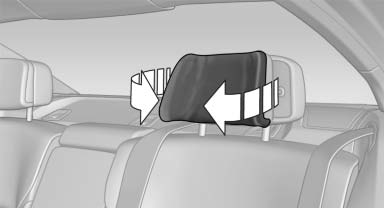 Fold the side extensions on the head restraint