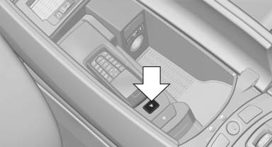 Press the button and remove the mobile phone.
