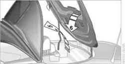 6.  Together with another person, press down the front convertible top frame
