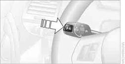 Press the button in the turn signal/high beam lever.