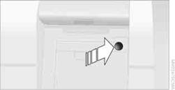 2.  Press the button, reach into the recess and fold down the cover. To