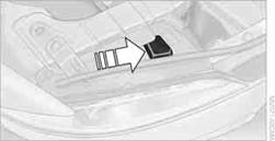 2. Turn the bulb holder, see arrow, and remove it.